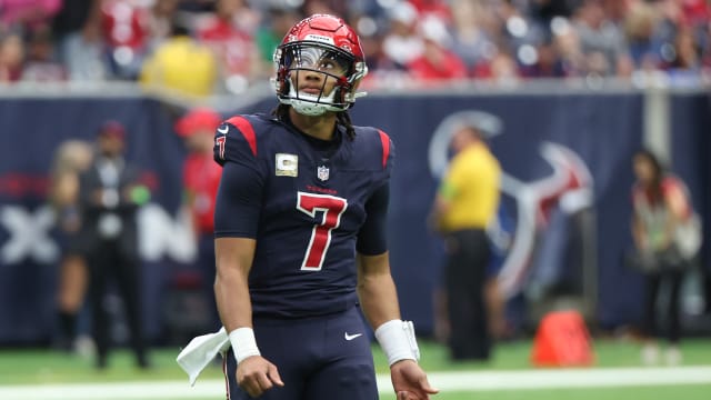Houston Texans quarterback C.J. Stroud (7) looks at the replay while playing against the Arizona Cardinals in the first quarter at NRG Stadium.