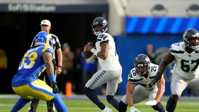 Seattle Seahawks quarterback Geno Smith (7) looks to pass against the Los Angeles Rams in the first quarter at SoFi Stadium.
