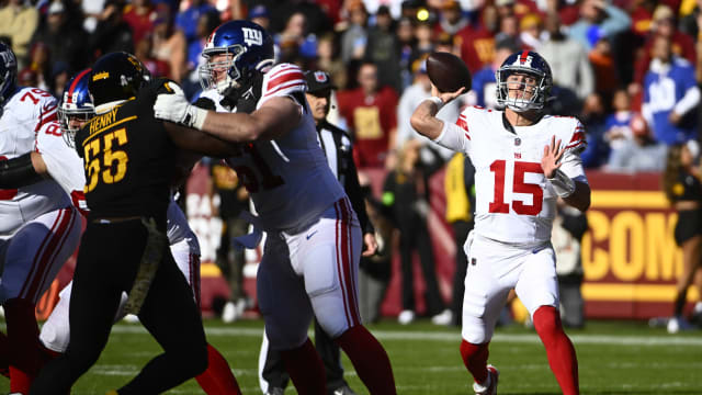 Nov 19, 2023; Landover, Maryland, USA; New York Giants quarterback Tommy DeVito (15) attempts a pass against the Washington Commanders during the first half at FedExField.