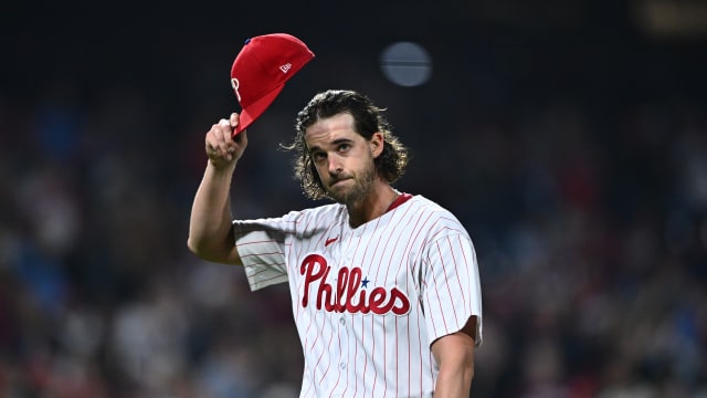 Sep 26, 2023; Philadelphia, Pennsylvania, USA; Philadelphia Phillies starting pitcher Aaron Nola (27) tips his cap to the crowd against the Pittsburgh Pirates in the seventh inning at Citizens Bank Park.