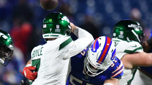 Jets' QB Tim Boyle absorbs a hit from Bills' DE AJ Epenesa