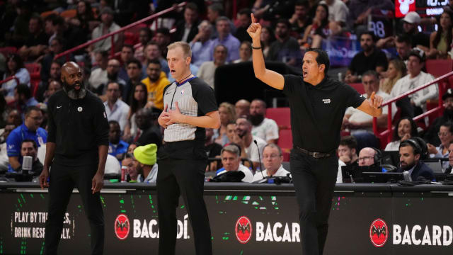 Miami Heat head coach Erik Spoelstra reacts in the game in front of Brooklyn Nets head coach Jacque Vaughn