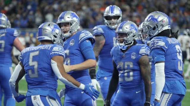 Detroit Lions Jared Goff, David Montgomery celebrate at Ford Field