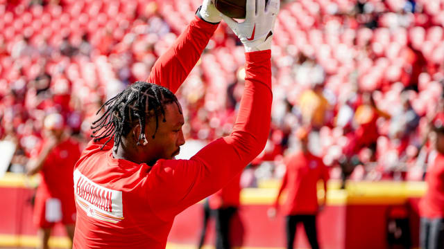 Oct 22, 2023; Kansas City, Missouri, USA; Kansas City Chiefs wide receiver Mecole Hardman Jr. (12) warms up against the Los Angeles Chargers prior to a game at GEHA Field at Arrowhead Stadium. Mandatory Credit: Denny Medley-USA TODAY Sports  