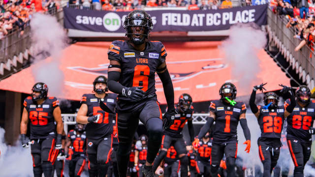 Jun 17, 2023; Vancouver, British Columbia, CAN; BC Lions defensive back TJ Lee (6) leads the Lions as they run onto the field prior to the start of their game against the Edmonton Elks at BC Place. Mandatory Credit: Bob Frid-USA TODAY Sports