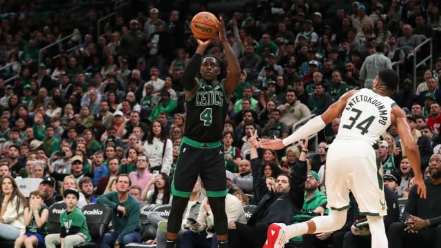  Boston Celtics guard Jrue Holiday (4) shoots during the first half against the Milwaukee Bucks
