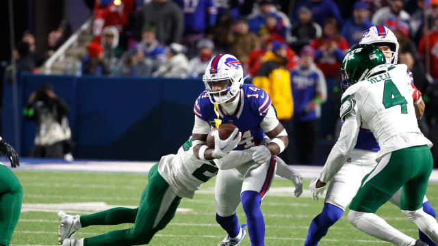 Bills' WR Stefon Diggs (14) tackled after a catch against the Jets