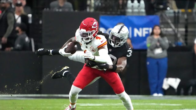 Nov 26, 2023; Paradise, Nevada, USA; Kansas City Chiefs wide receiver Rashee Rice (4) is tackled by Las Vegas Raiders cornerback Nate Hobbs (39) in the first half at Allegiant Stadium. Mandatory Credit: Kirby Lee-USA TODAY Sports  