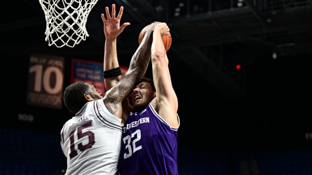 Mississippi State Bulldogs forward Jimmy Bell Jr. (15) blocks a shot by Northwestern Wildcats forward Blake Preston (32) during the first half at Mohegan Sun Arena.