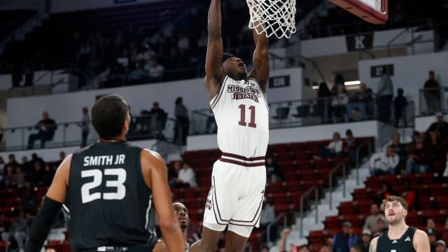 Nov 14, 2023; Starkville, Mississippi, USA; Mississippi State Bulldogs guard Trey Fort (11) dunks during the first half against the North Alabama Lions at Humphrey Coliseum. Mandatory Credit: Petre Thomas-USA TODAY Sports