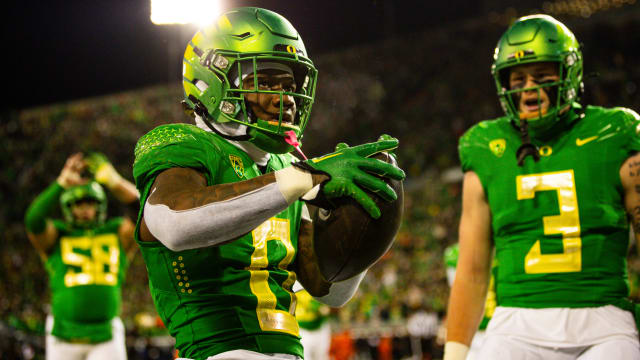 Oregon Ducks running back Bucky Irving celebrates a touchdown against the Oregon State Beavers.