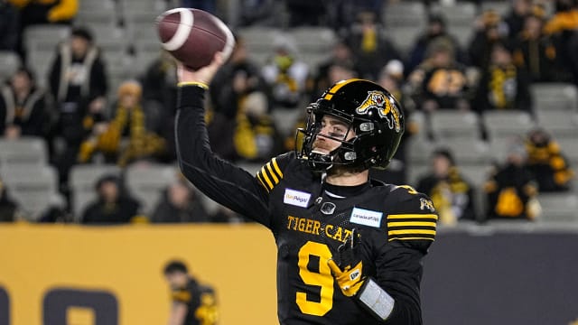 Dec 12, 2021; Hamilton, Ontario, CAN; Hamilton Tiger-Cats quarterback Dane Evans (9) throws a pass during warmup for the 108th Grey Cup football game against Winnipeg Blue Bombers at Tim Hortons Field. Mandatory Credit: John E. Sokolowski-USA TODAY Sports
