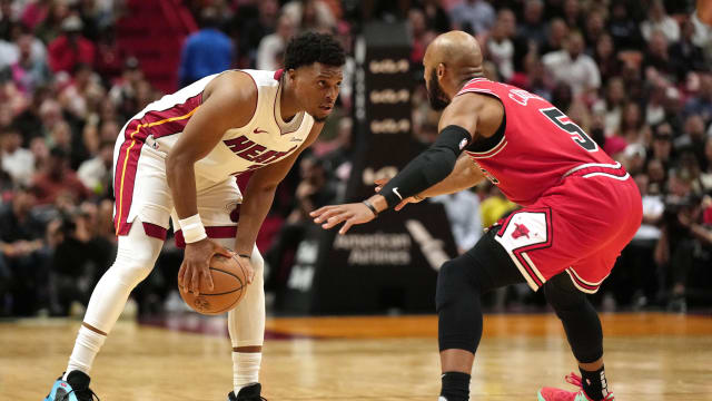 Chicago Bulls guard Jevon Carter (5) defends Miami Heat guard Kyle Lowry (7) during the second half at Kaseya Center. 