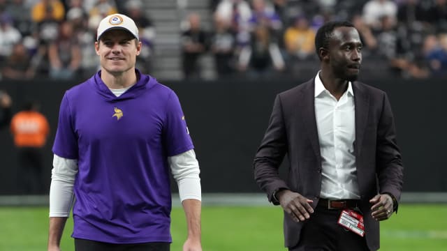 Dec 10, 2023; Paradise, Nevada, USA; Minnesota Vikings coach Kevin O'Connell (left) and general manager Kwesi Adofo-Mensah react during the game against the Minnesota Vikings at Allegiant Stadium.