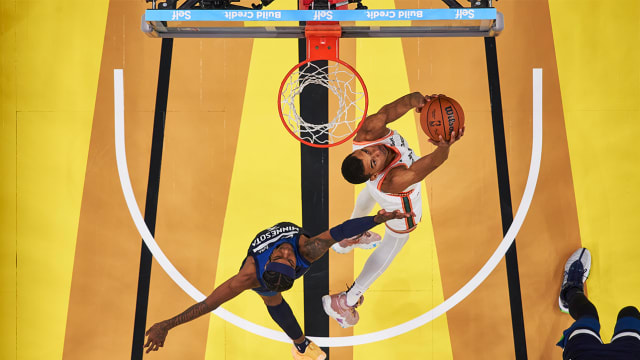 The Spurs’ Victor Wembanyama drops a reverse slam dunk vs. Minnesota.