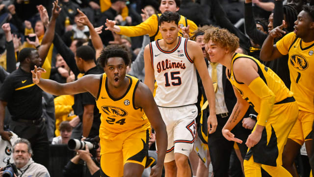 Dec 22, 2022; St. Louis, Missouri, USA; Missouri Tigers guard Kobe Brown (24) reacts after making a three pointer against the Illinois Fighting Illini during the second half at Enterprise Center. Mandatory Credit: Jeff Curry-USA TODAY Sports