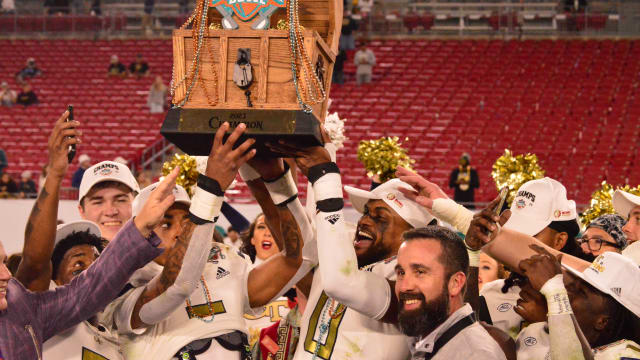 Georgia Tech being presented the trophy for the Gasparilla Bowl