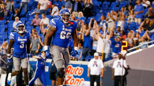 Memphis' Makylan Pounders (66) celebrates after the team scored a touchdown during the game between Memphis and Navy in Memphis, Tenn., on Thursday, September 14, 2023.