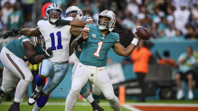 Dec 24, 2023; Miami Gardens, Florida, USA; Miami Dolphins quarterback Tua Tagovailoa (1) throws the football against the Dallas Cowboys during the first quarter at Hard Rock Stadium. 