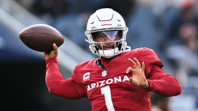 Arizona Cardinals quarterback Kyler Murray (1) warms up before a game against the Chicago Bears at Soldier Field.