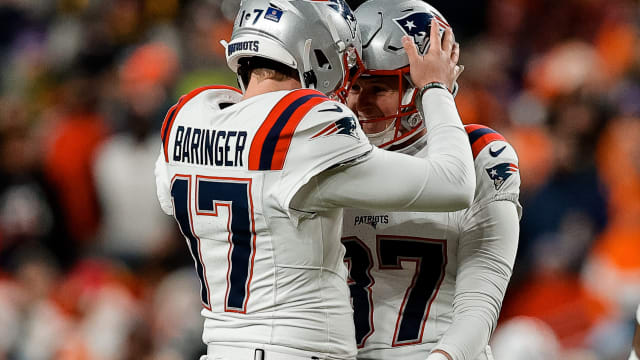 New England Patriots place kicker Chad Ryland (37) reacts with punter Bryce Baringer (17) after a field goal in the second quarter against the Denver Broncos at Empower Field at Mile High.