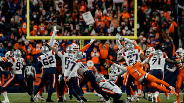 New England Patriots place kicker Chad Ryland (37) scores the game winning field goal on a hold from punter Bryce Baringer (17) as Denver Broncos cornerback Tremon Smith (1) defends in the fourth quarter at Empower Field at Mile High.