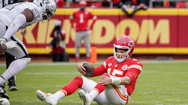 Dec 25, 2023; Kansas City, Missouri, USA; Kansas City Chiefs quarterback Patrick Mahomes (15) reacts after being sacked by Las Vegas Raiders defensive end Malcolm Koonce (51) during the first half at GEHA Field at Arrowhead Stadium. Mandatory Credit: Denny Medley-USA TODAY Sports  