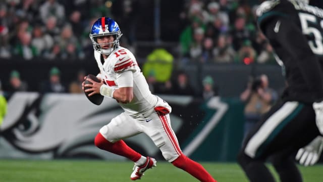 Dec 25, 2023; Philadelphia, Pennsylvania, USA; New York Giants quarterback Tommy DeVito (15) looks for a receiver against the Philadelphia Eagles during the second quarter at Lincoln Financial Field.