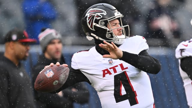 Dec 31, 2023; Chicago, Illinois, USA; Atlanta Falcons quarterback Taylor Heinicke (4) warms up before a game against the Chicago Bears at Soldier Field.