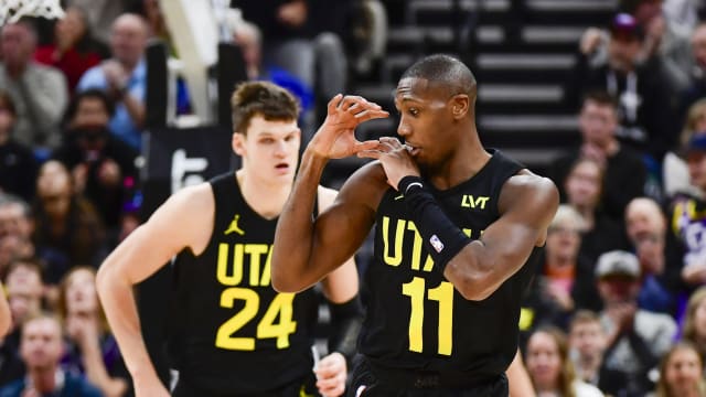  Utah Jazz guard Kris Dunn (11) reacts to a three point shot 