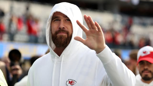 Jan 7, 2024; Inglewood, California, USA; Kansas City Chiefs tight end Travis Kelce (87) waves to fans before the game against the Los Angeles Chargers at SoFi Stadium. Mandatory Credit: Kiyoshi Mio-USA TODAY Sports  