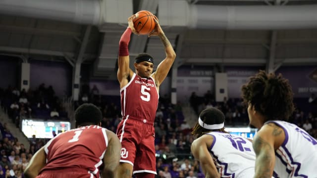 Jan 10, 2024; Fort Worth, Texas, USA; Oklahoma Sooners guard Rivaldo Soares (5) grabs a rebound against TCU Horned Frogs forward Xavier Cork (12) during the first half at Ed and Rae Schollmaier Arena. Mandatory Credit: Chris Jones-USA TODAY Sports  