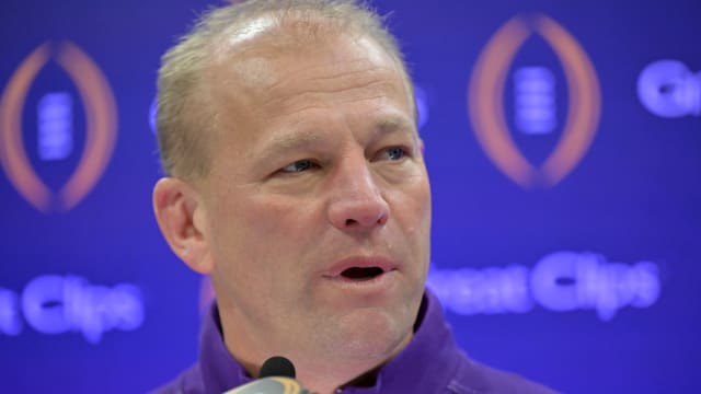 Washington Huskies head coach Kalen DeBoer talks to the media during media day before the College Football Playoff national championship game against the Michigan Wolverines at George R Brown Convention Center.