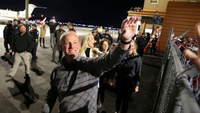 Jan 12, 2024; Tuscaloosa, AL, USA; Alabama fans greet new head football coach Kalen DeBoer as he and his family arrive at the airport in Tuscaloosa Friday.  