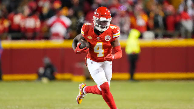 Jan 13, 2024; Kansas City, Missouri, USA; Kansas City Chiefs wide receiver Rashee Rice (4) runs the ball against the Miami Dolphins during the second half of the 2024 AFC wild card game at GEHA Field at Arrowhead Stadium. Mandatory Credit: Jay Biggerstaff-USA TODAY Sports  