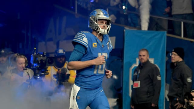 Detroit Lions quarterback Jared Goff takes the field during starting lineup introductions.