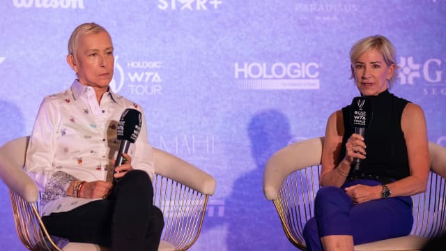 Martina Navratilova, left, and Chris Evert talk at a panel