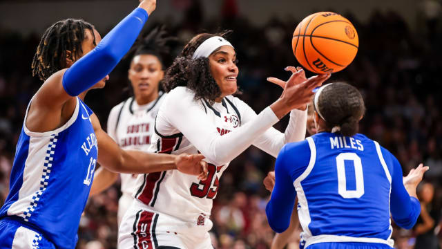 South Carolina Gamecocks center Sakima Walker (35) grabs a rebound from Kentucky Wildcats forward Ajae Petty (13) and guard Brooklynn Miles (0) in the second half at Colonial Life Arena.