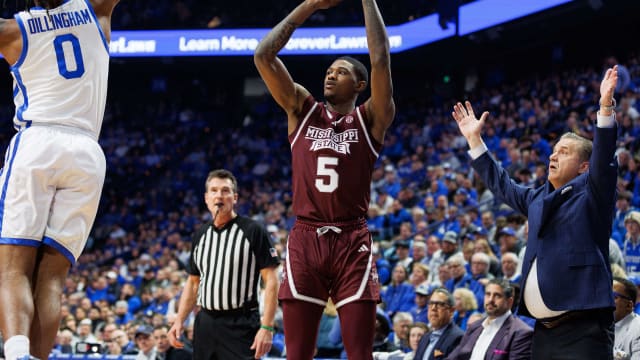 Mississippi State Bulldogs guard Shawn Jones Jr. (5) makes a three point basket during the first half against the Kentucky Wildcats at Rupp Arena at Central Bank Center.
