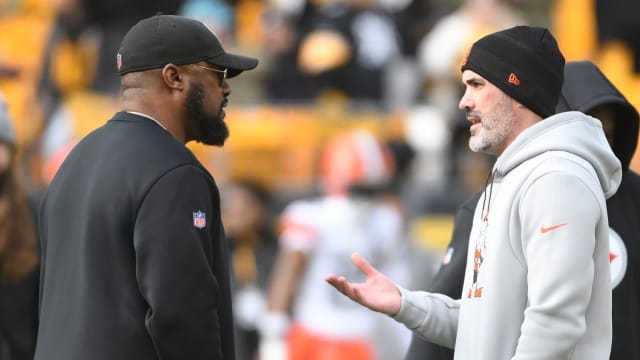 Jan 8, 2023; Pittsburgh, Pennsylvania, USA; Pittsburgh Steelers head coach Mike Tomlin (left) meets with Cleveland Browns head coach Kevin Stefanski before their game at Acrisure Stadium. Mandatory Credit: Philip G. Pavely-USA TODAY Sports