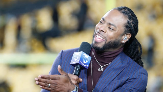 Dec 7, 2023; Pittsburgh, Pennsylvania, USA; Amazon Prime Video Thursday Night Football analyst Richard Sherman performs the pre-game broadcast before the Pittsburgh Steelers host the New England Patriots at Acrisure Stadium. Mandatory Credit: Charles LeClaire-USA TODAY Sports