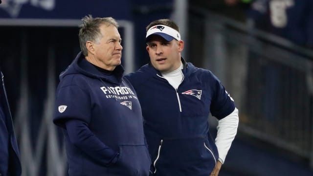 Jan 4, 2020; Foxborough, Massachusetts, USA; New England Patriots head coach Bill Belichick and offensive coordinator Josh McDaniels on the field before their playoff game against the Tennessee Titans at Gillette Stadium.