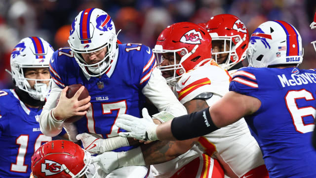 Jan 21, 2024; Orchard Park, New York, USA; Buffalo Bills quarterback Josh Allen (17) rushes the ball against the Kansas City Chiefs during the second half for the 2024 AFC divisional round game at Highmark Stadium. Mandatory Credit: Mark J. Rebilas-USA TODAY Sports  