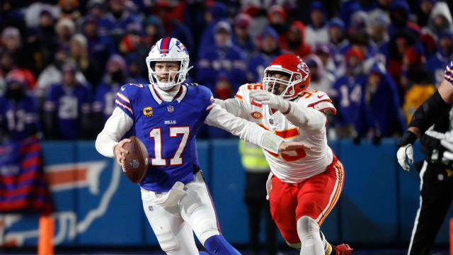 Chiefs defensive lineman Chris Jones runs down Bills quarterback Josh Allen during their AFC divisional game Sunday.