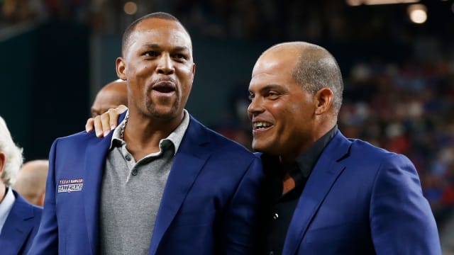 Former Texas Rangers third baseman Adrian Beltre, left, and Ivan Rodriguez, during Beltre's No. 29 jersey retirement at Globe Life Field in 2021. Beltre will join Rodriguez in the National Baseball Hall of Fame during an induction ceremony on July 21 in Cooperstown, N.Y. after earning a first-ballot election on Tuesday.