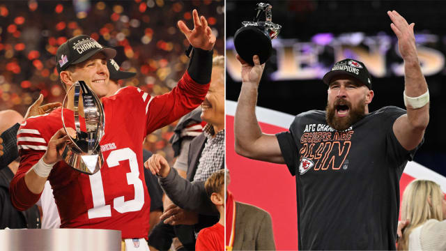 Brock Purdy holds the NFC trophy with one hand up; Travis Kelce lifts the AFC trophy over his head with his hands in the air