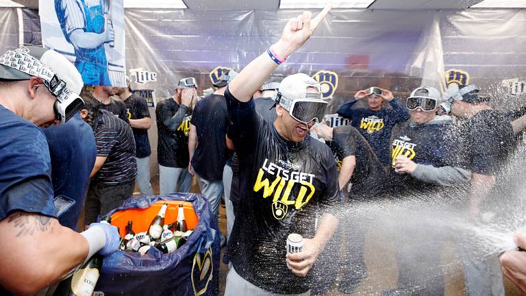 Brewers clinch postseason berth with 