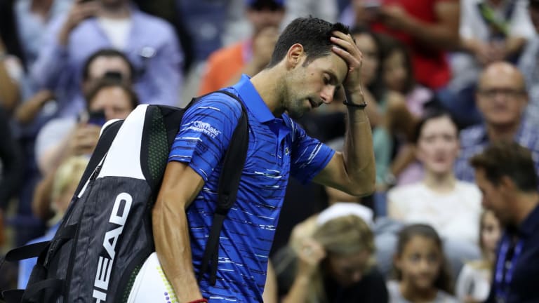 Stan Wawrinka Advances at US Open After Novak Djokovic Retires in Third Set