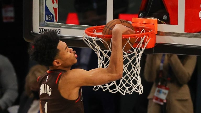 High-Flying Anfernee Simons Kisses His Way To Dunk Contest Crown
