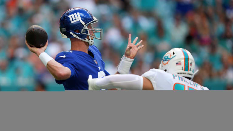 Anemic Giants Fall to Dolphins 20-9